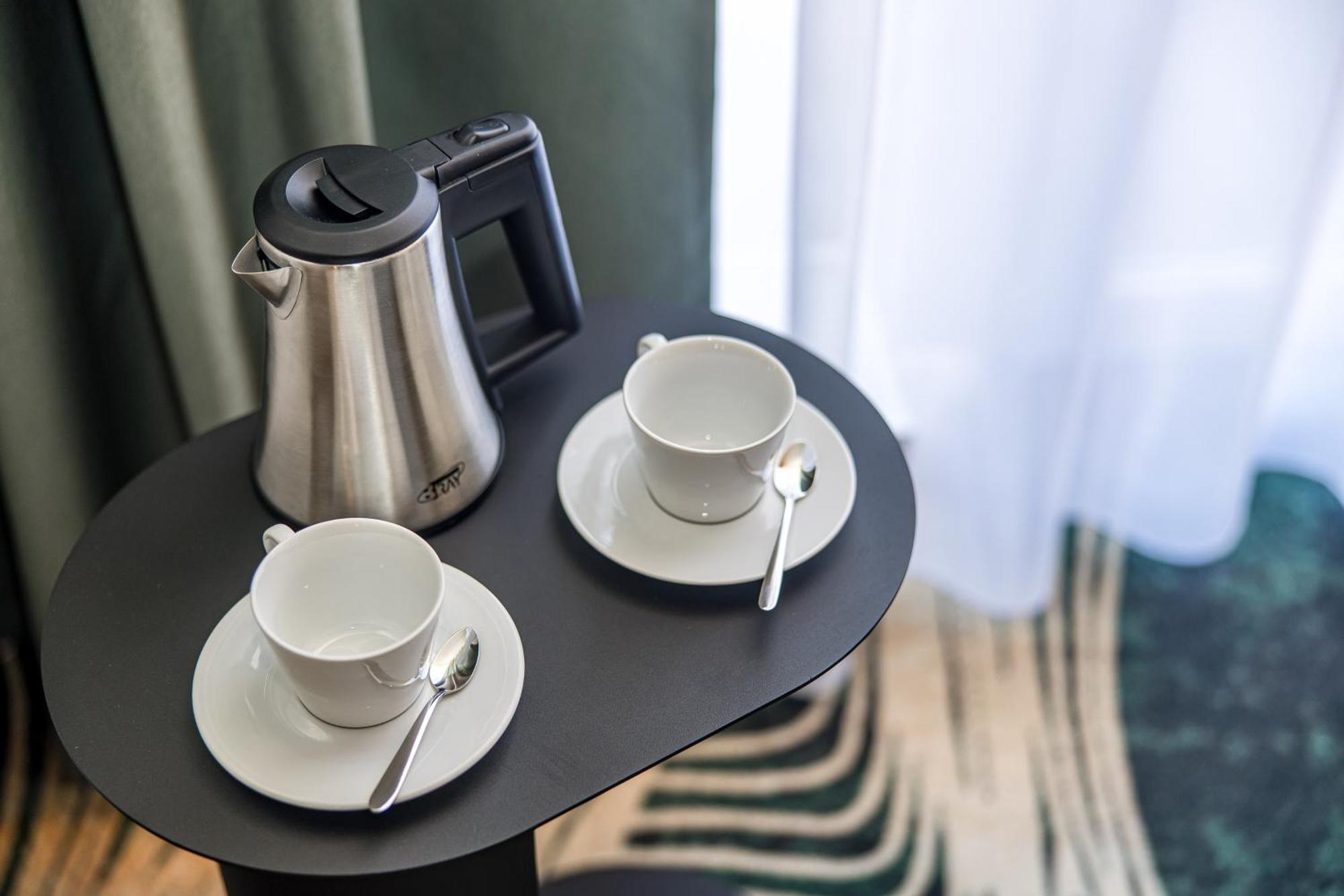 Mercure Palanga Vanagupe Resort & Spa מראה חיצוני תמונה A kettle in a hotel room
